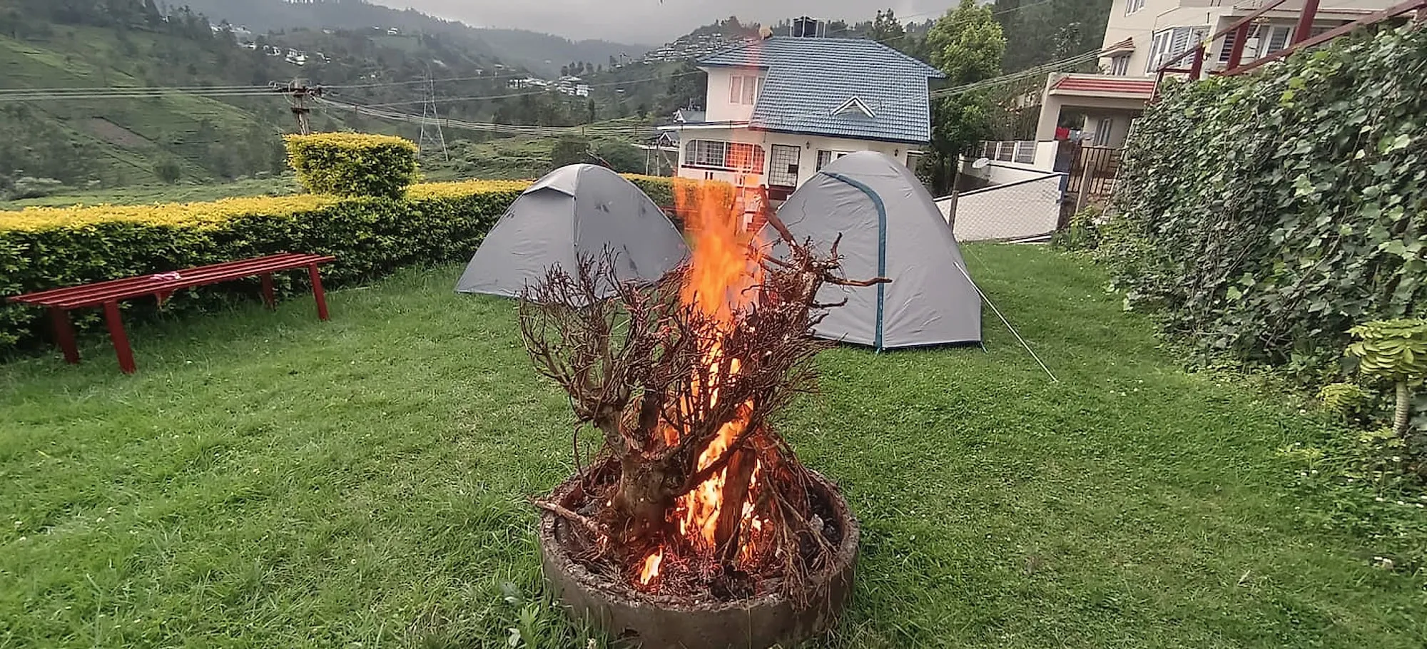 Bonfire and tents on the lawn
